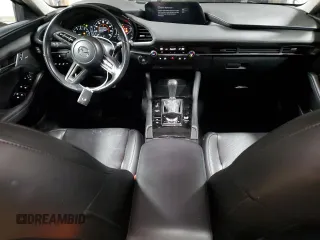 2019 Mazda 3 Premium with VIN 3MZBPAEM7KM102348, listed as a Copart auction lot 84587534 with 73,125 mi miles and Salvage Title. Bid and sale history available at DreamBid. Image 8.