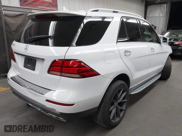2017 Mercedes-Benz GLE 350 with VIN 4JGDA5JB8HA866073, listed as a IAAI auction lot 42394019 with 159,034 mi miles and . Bid and sale history available at DreamBid. Image 4.