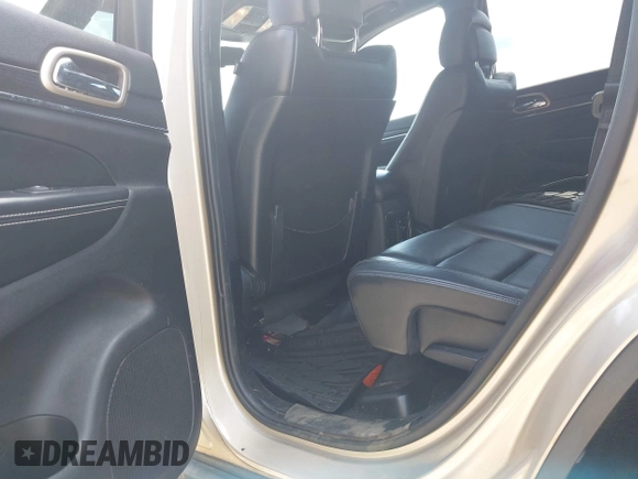 2014 Jeep Grand Cherokee Limited with VIN 1C4RJFBG1EC148701, listed as a IAAI auction lot 42552429 with 225,514 mi miles and . Bid and sale history available at DreamBid. Image 8.