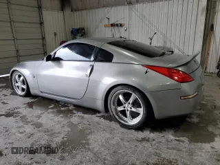 2004 Nissan 350Z Touring z VIN JN1AZ34D74T162174, wystawiony jako Copart lot #56205705 z przebiegiem 184 048 mil mil oraz Czysty tytuł • Clean title. Historia ofert i sprzedaży dostępna na DreamBid. Obrazek 2.