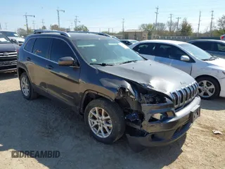 2017 Jeep Cherokee Latitude with VIN 1C4PJLCB4HW661047, listed as a IAAI auction lot 41692591 with 132,876 mi miles and . Bid and sale history available at carsss.com. Image 1.