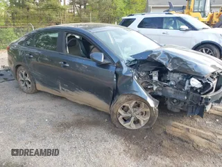 2021 Kia Forte LXS z VIN 3KPF24AD6ME372761, wystawiony jako IAAI lot #42135790 z przebiegiem 62 310 mil mil oraz . Historia ofert i sprzedaży dostępna na DreamBid. Obrazek 1.