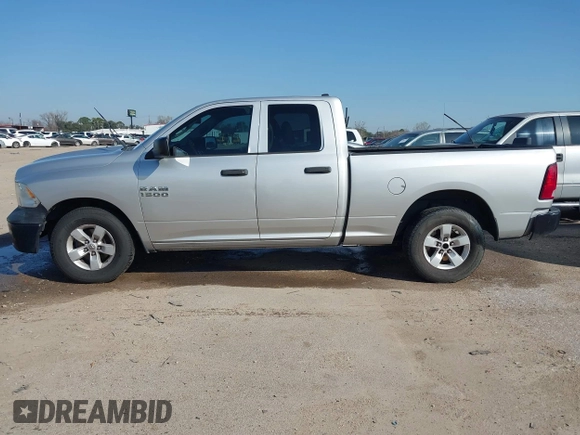 2014 Ram 1500 Tradesman with VIN 1C6RR6FG8ES314972, listed as a IAAI auction lot 41563554 with 233,285 mi miles and . Bid and sale history available at DreamBid. Image 14.