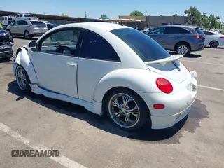 1999 Volkswagen Beetle GLS with VIN 3VWCC21C9XM451389, listed as a IAAI auction lot 42542673 with 162,062 mi miles and . Bid and sale history available at DreamBid. Image 3.