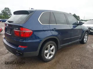 2011 BMW X5 50i with VIN 5UXZV8C57BL417856, listed as a IAAI auction lot 42478859 with 111,243 mi miles and . Bid and sale history available at DreamBid. Image 4.