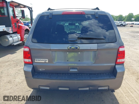 2012 Ford Escape XLT with VIN 1FMCU9D75CKC22907, listed as a IAAI auction lot 42571195 with 198,537 mi miles and . Bid and sale history available at DreamBid. Image 16.