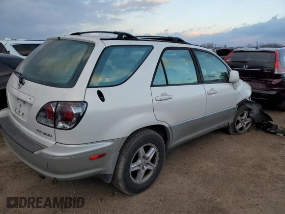 2003 Lexus RX 300 z VIN JTJHF10U930312488, wystawiony jako Copart lot #46572575 z przebiegiem 189 058 mil mil oraz Szkoda całkowita • Salvage title. Historia ofert i sprzedaży dostępna na DreamBid. Obrazek 3.