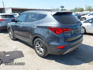 2017 Hyundai Santa Fe 2.4L z VIN 5XYZU3LB4HG462058, wystawiony jako IAAI lot #41861190 z przebiegiem 87 102 mil mil oraz . Historia ofert i sprzedaży dostępna na DreamBid. Obrazek 3.