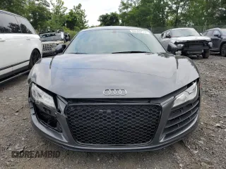 2010 Audi R8 z VIN WUAAUAFGXAN001411, wystawiony jako Copart lot #66520774 z przebiegiem 21 691 mil mil oraz Szkoda całkowita • Salvage title. Historia ofert i sprzedaży dostępna na DreamBid. Obrazek 5.