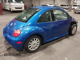 2004 Volkswagen New Beetle Coupe GLS with VIN 3VWCK31C14M421761, listed as a IAAI auction lot 41771431 with 76,184 mi miles. Bid and sale history available at carsss.com. Image 4.
