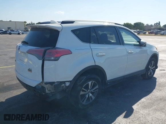 2018 Toyota RAV4 XLE with VIN JTMWFREV3JJ753454, listed as a IAAI auction lot 41775159 with 75,078 mi miles. Bid and sale history available at carsss.com. Image 4.