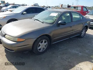 2002 Oldsmobile Alero GL1 z VIN 1G3NL52E82C172314, wystawiony jako IAAI lot #41465789 z przebiegiem 118 427 mil mil oraz . Historia ofert i sprzedaży dostępna na DreamBid. Obrazek 2.