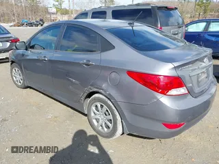 2014 Hyundai Accent GLS with VIN KMHCT4AEXEU710606, listed as a IAAI auction lot 41764163 with 103,859 mi miles. Bid and sale history available at carsss.com. Image 3.