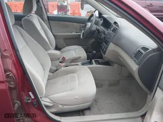 2006 Kia Spectra EX with VIN KNAFE121365373274, listed as a IAAI auction lot 41678550 with 223,884 mi miles. Bid and sale history available at carsss.com. Image 5.