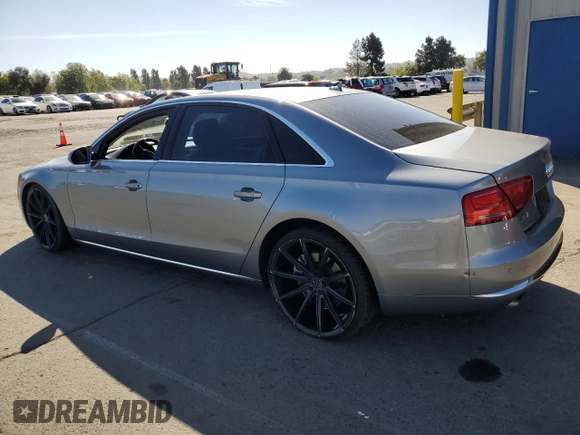2012 Audi A8 z VIN WAURVAFD7CN023286, wystawiony jako Copart lot #56594745 z przebiegiem 199 443 mil mil oraz Czysty tytuł • Clean title. Historia ofert i sprzedaży dostępna na DreamBid. Obrazek 2.