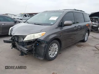 2011 Toyota Sienna XLE AAS with VIN 5TDYK3DC1BS136012, listed as a IAAI auction lot 41869637 with 231,418 mi miles. Bid and sale history available at carsss.com. Image 23.