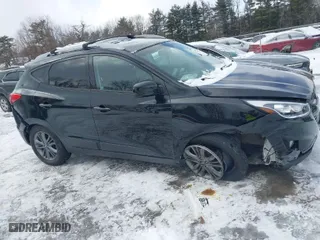 2015 Hyundai Tucson SE with VIN KM8JU3AG2FU103035, listed as a IAAI auction lot 41592256 with 105,792 mi miles. Bid and sale history available at carsss.com. Image 13.