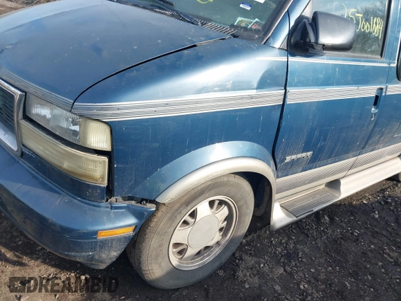 2002 GMC Safari z VIN 1GDDM19X22B514706, wystawiony jako IAAI lot #41647881 z przebiegiem Nie podano mil oraz . Historia ofert i sprzedaży dostępna na DreamBid. Obrazek 6.