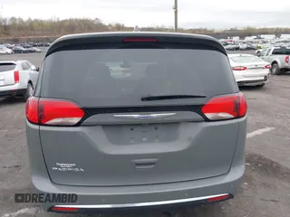 2020 Chrysler Pacifica Touring with VIN 2C4RC1FG3LR245765, listed as a IAAI auction lot 42069689 with 40,869 mi miles and . Bid and sale history available at DreamBid. Image 16.