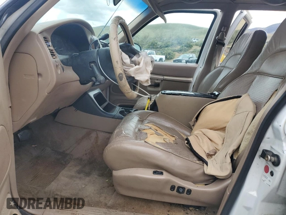 1997 Ford Explorer XLT with VIN 1FMDU35P0VZA19790, listed as a Copart auction lot 56766165 with 278,955 mi miles and Salvage title. Bid and sale history available at DreamBid. Image 7.