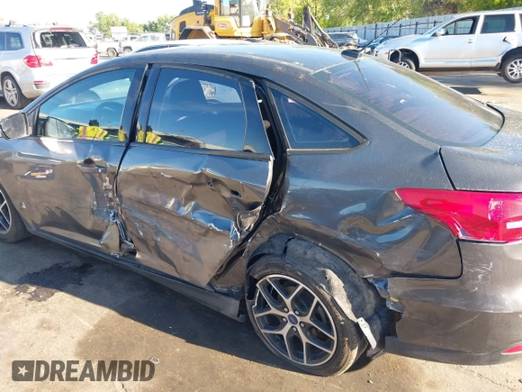 2018 Ford Focus SE with VIN 1FADP3FE0JL270966, listed as a IAAI auction lot 42206548 with 89,067 mi miles and . Bid and sale history available at DreamBid. Image 6.