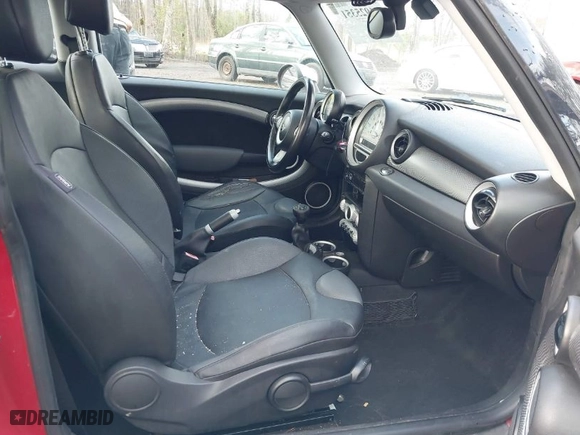 2009 MINI Cooper Hardtop S with VIN WMWMF735X9TT97788, listed as a IAAI auction lot 41925351 with 150,858 mi miles. Bid and sale history available at carsss.com. Image 5.
