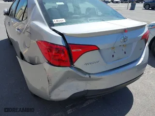 2019 Toyota Corolla L with VIN 5YFBURHE8KP882089, listed as a IAAI auction lot 39545437 with 117,129 mi miles. Bid and sale history available at carsss.com. Image 6.