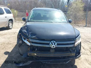 2017 Volkswagen Tiguan S with VIN WVGBV7AX9HK039244, listed as a IAAI auction lot 42050325 with 70,828 mi miles and . Bid and sale history available at DreamBid. Image 12.