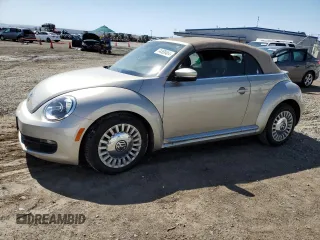 2013 Volkswagen Beetle 2.5L with VIN 3VW5P7ATXDM820895, listed as a Copart auction lot 74388464 with Not Provided miles and Salvage Title. Bid and sale history available at DreamBid. Image 1.