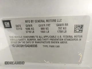 2013 Chevrolet Sonic LS with VIN 1G1JA5SH1D4246936, listed as a IAAI auction lot 42665664 with 124,464 mi miles and . Bid and sale history available at DreamBid. Image 9.