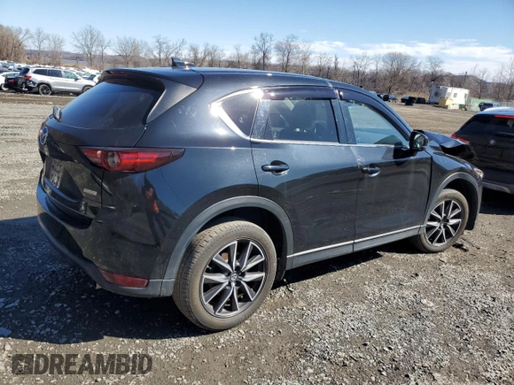 2017 Mazda CX-5 Grand Touring with VIN JM3KFBDL6H0211374, listed as a Copart auction lot 49079775 with 142,164 mi miles and Salvage Title. Bid and sale history available at carsss.com. Image 3.
