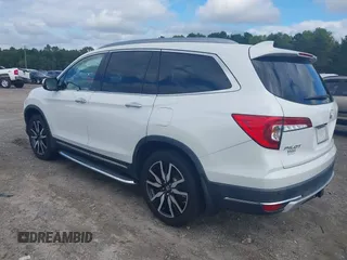 2020 Honda Pilot Elite with VIN 5FNYF6H08LB014288, listed as a IAAI auction lot 40496871 with 57,921 mi miles and . Bid and sale history available at DreamBid. Image 3.