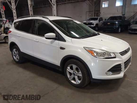 2014 Ford Escape SE with VIN 1FMCU9G90EUD81774, listed as a IAAI auction lot 42067148 with 115,277 mi miles. Bid and sale history available at carsss.com. Image 1.