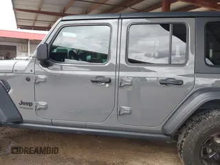 2020 Jeep Wrangler Unlimited Black and Tan с VIN 1C4HJXDG3LW266615, выставлен на аукционе IAAI как лот 42207899 с пробегом 55 291 миль миль и . История ставок и продаж доступна на DreamBid. Изображение 14.