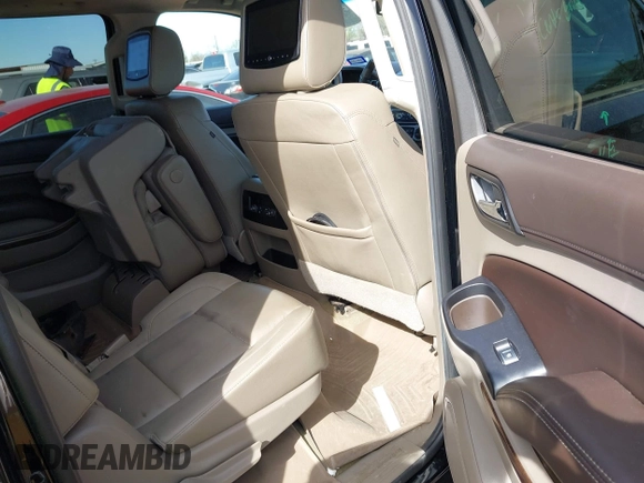2016 Chevrolet Suburban LT with VIN 1GNSKHKC4GR275389, listed as a IAAI auction lot 41796216 with 144,776 mi miles and . Bid and sale history available at DreamBid. Image 8.