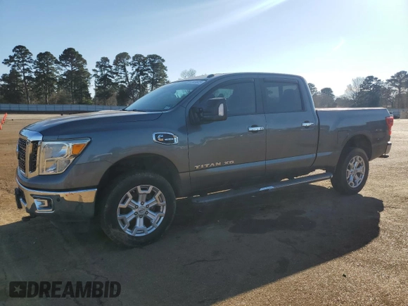 2016 Nissan Titan SL z VIN 1N6BA1F22GN503205, wystawiony jako Copart lot #47024925 z przebiegiem 90 936 mil mil oraz Czysty tytuł • Clean title. Historia ofert i sprzedaży dostępna na DreamBid. Obrazek 1.