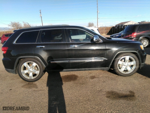 2012 Jeep Grand Cherokee Overland with VIN 1C4RJFCT8CC268410, listed as a IAAI auction lot 41823909 with 205,940 mi miles. Bid and sale history available at carsss.com. Image 13.