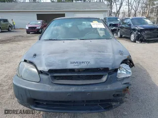 1996 Honda Civic DX with VIN 2HGEJ6344TH115500, listed as a IAAI auction lot 41783022 with 148,439 mi miles. Bid and sale history available at carsss.com. Image 12.