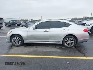2013 Infiniti M with VIN JN1BY1AP4DM513899, listed as a IAAI auction lot 41854573 with 202,480 mi miles and . Bid and sale history available at carsss.com. Image 14.