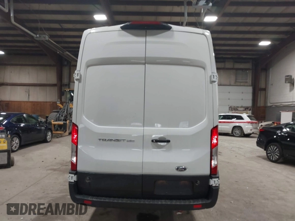 2020 Ford Transit Cargo with VIN 1FTBR3X85LKA65544, listed as a IAAI auction lot 42006800 with 55,497 mi miles and . Bid and sale history available at DreamBid. Image 17.