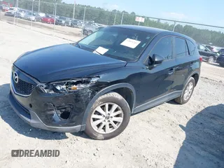 2014 Mazda CX-5 Sport z VIN JM3KE2BE2E0325715, wystawiony jako IAAI lot #42683243 z przebiegiem 262 005 mil mil oraz . Historia ofert i sprzedaży dostępna na DreamBid. Obrazek 2.