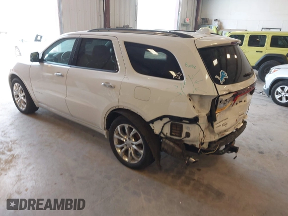 2016 Dodge Durango Citadel with VIN 1C4RDJEG9GC371805, listed as a IAAI auction lot 42135988 with 122,924 mi miles and . Bid and sale history available at DreamBid. Image 3.