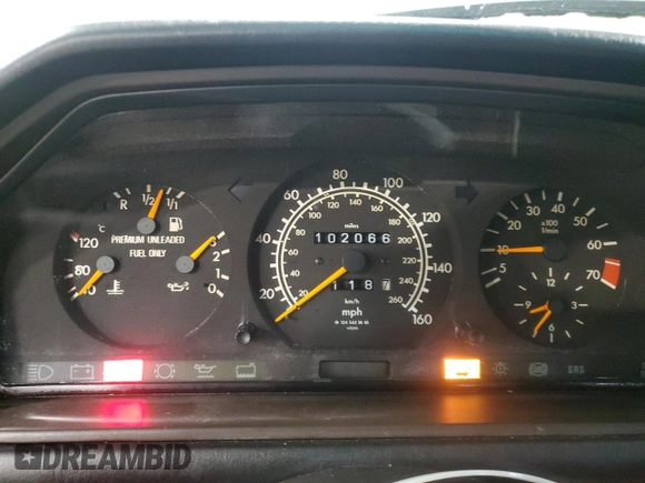 1995 Mercedes-Benz E 320 with VIN WDBEA32E2SC168493, listed as a Copart auction lot 82365704 with 102,066 mi miles and Salvage Title. Bid and sale history available at DreamBid. Image 9.