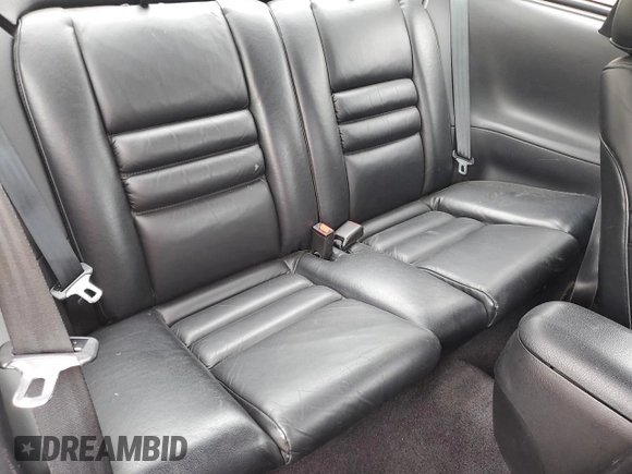 1996 Ford Mustang GT z VIN 1FALP42X8TF196321, wystawiony jako Copart lot #50874885 z przebiegiem 86 945 mil mil oraz Szkoda całkowita • Salvage title. Historia ofert i sprzedaży dostępna na DreamBid. Obrazek 10.