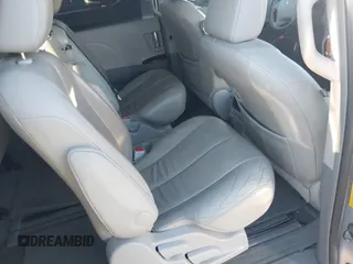 2014 Toyota Sienna XLE z VIN 5TDYK3DC9ES508300, wystawiony jako IAAI lot #41867307 z przebiegiem 93 798 mil mil oraz . Historia ofert i sprzedaży dostępna na DreamBid. Obrazek 8.