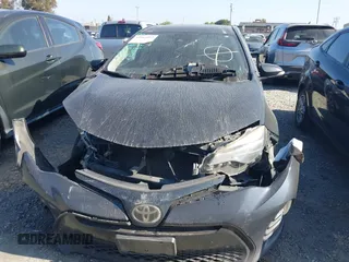 2019 Toyota Corolla L with VIN 2T1BURHE3KC137878, listed as a IAAI auction lot 41861012 with 145,668 mi miles and . Bid and sale history available at DreamBid. Image 13.