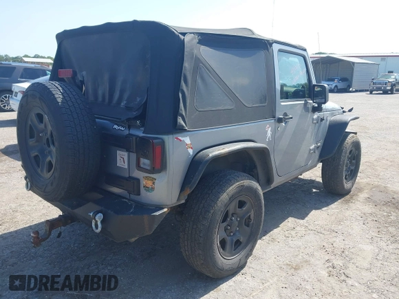 2014 Jeep Wrangler Sport with VIN 1C4AJWAG0EL126459, listed as a IAAI auction lot 42286803 with 179,025 mi miles and . Bid and sale history available at DreamBid. Image 4.