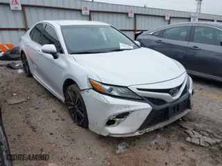 2018 Toyota Camry XSE with VIN 4T1B61HK9JU059976, listed as a IAAI auction lot 41393583 with 125,007 mi miles. Bid and sale history available at carsss.com. Image 1.