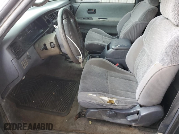 1997 Toyota T100 SR5 with VIN JT4UN24DXV0042713, listed as a Copart auction lot 41850085 with 271,722 mi miles and Salvage Title. Bid and sale history available at DreamBid. Image 7.