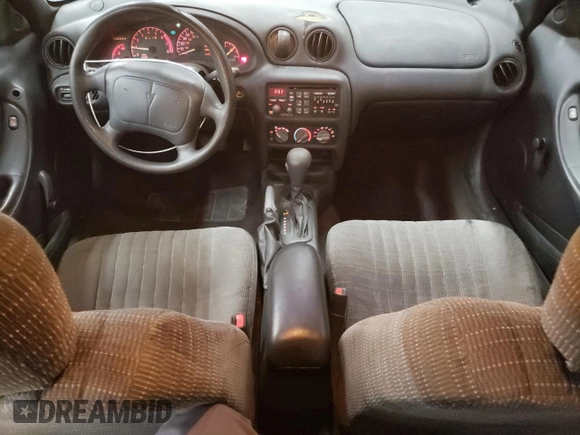 1997 Pontiac Grand Am SE with VIN 1G2NE52M8VC721326, listed as a Copart auction lot 75860034 with 110,209 mi miles and Salvage title. Bid and sale history available at DreamBid. Image 8.